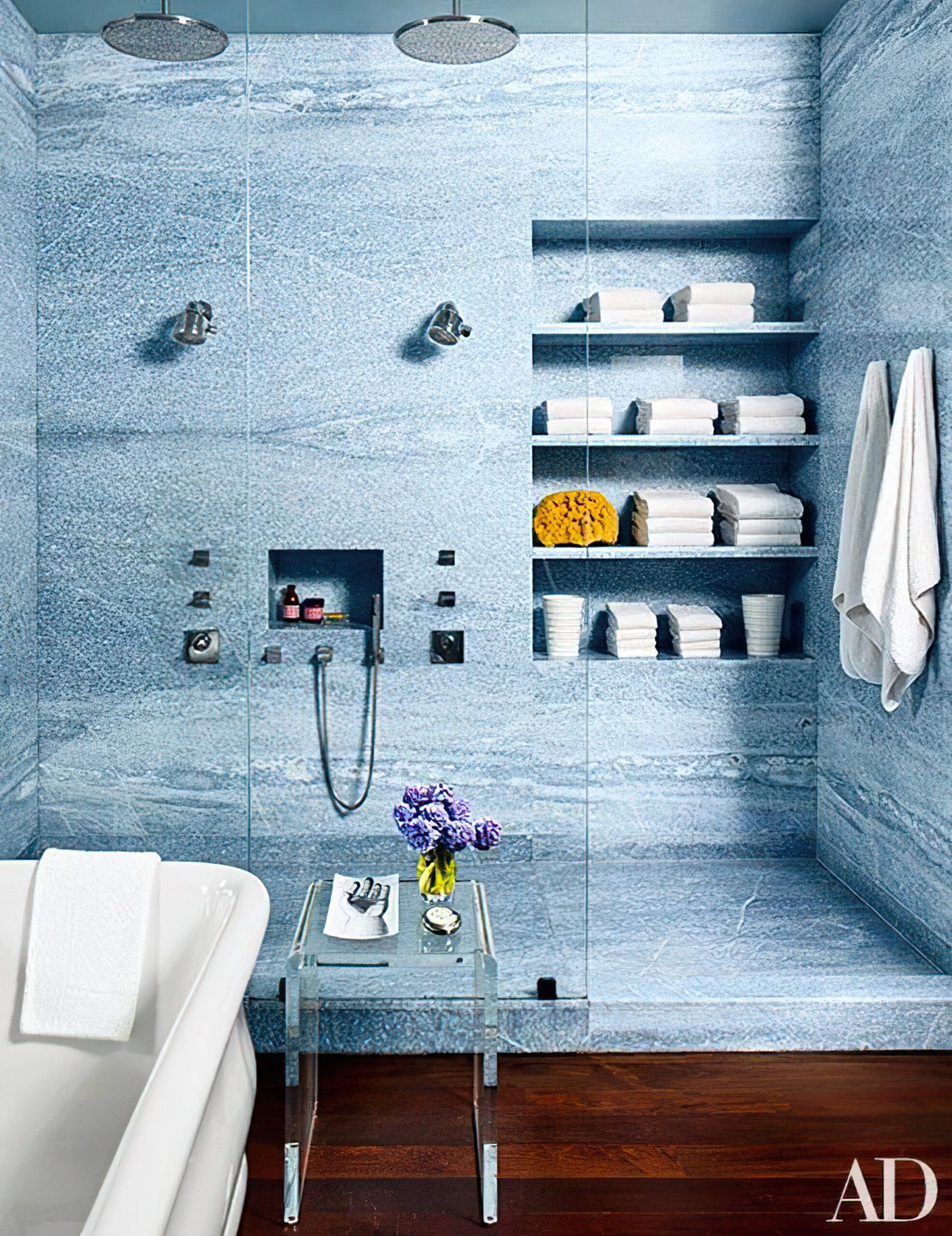 bathroom-with-blue-wall-with-bunch-toilet-paper-box-toilet-paper