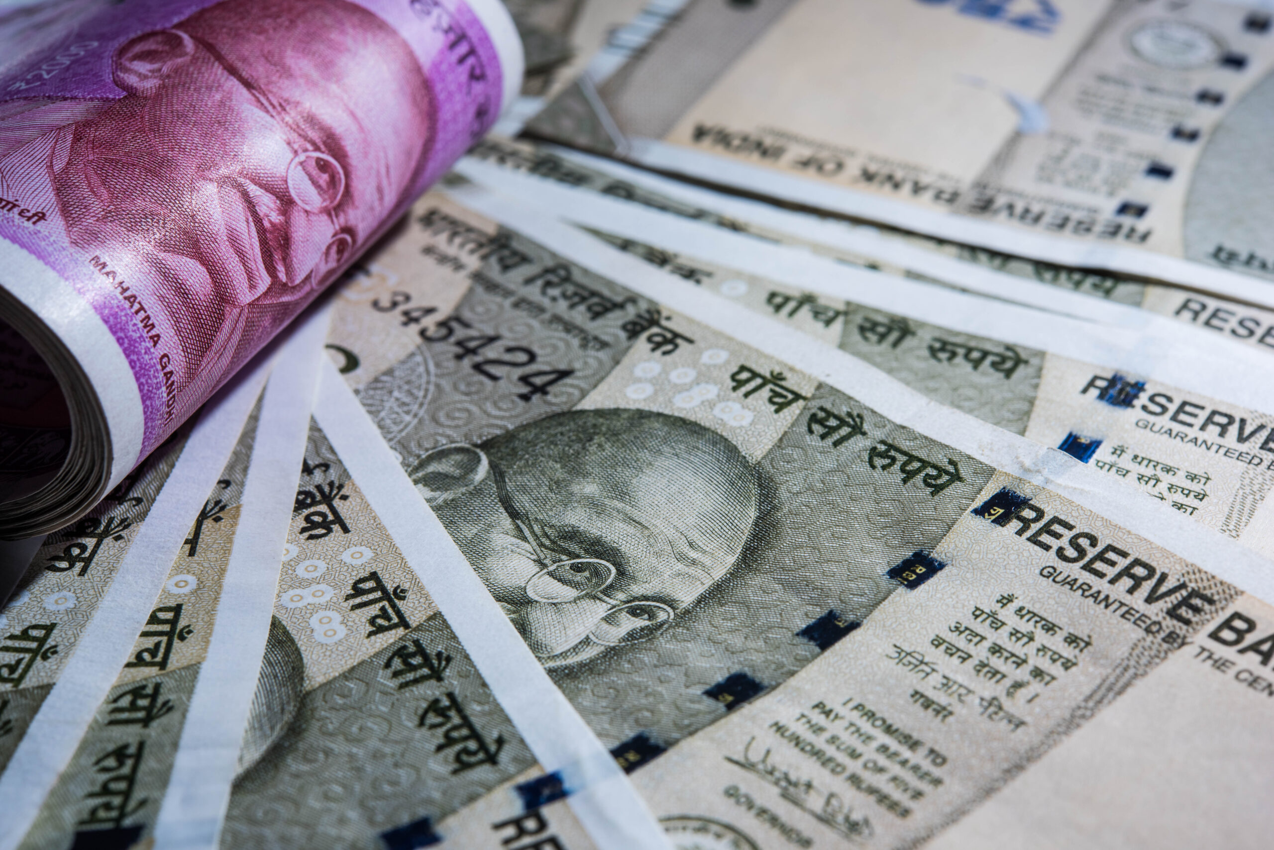 Extreme Closeup of New Indian Paper Currency Notes in abstract form or pattern