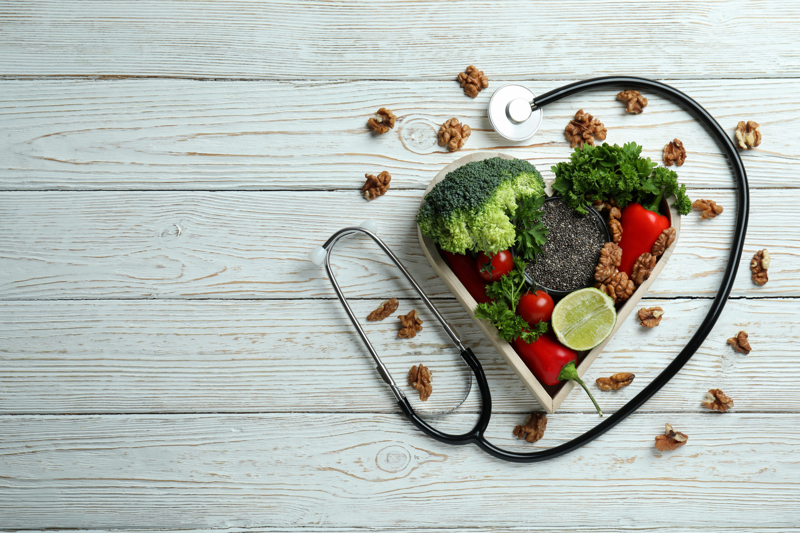 Healthy lifestyle accessories on white wooden table
